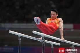 四川21金！邹敬园双杠卫冕：最幸福的事是一家人一块吃饭图片