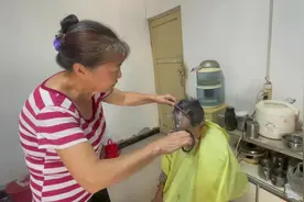 “他们只要需要，我随时为他们剪头发——记黄桷坪社区热心人杨俊辉图片