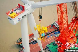 中国海油首个海上风电项目全容量并网发电图片