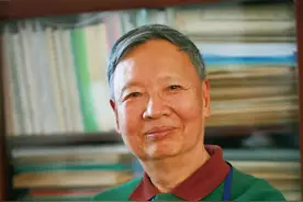 卢永根 把根深深扎在泥土里图片