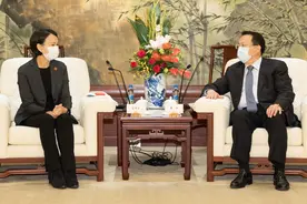 这家美国公司在中国开了1.1万家餐厅，上海市长会见图片