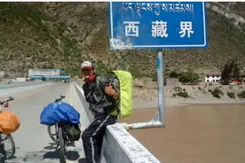 为什么徒步西藏的人，手里都要推个轮胎？就连女生也不例外图片