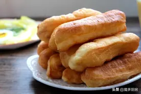 油条的家常做法，无添加剂，牛奶揉面，酵母发酵，外焦里嫩真好吃图片