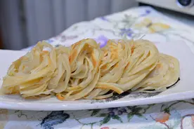 提起一根线，放下一窝丝，盘丝饼看着诱惑吃着香图片