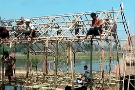 中国人在缅甸，实拍缅甸农村人怎么盖房子？不用1块砖头视频封面