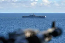 美国核航母带着“拳师”闯进南海 炫耀武力会不会惹火烧身？图片