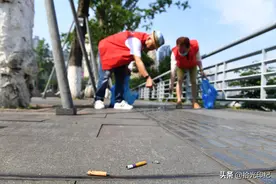 捡起小烟头，拾得大文明——南岸区举行全民动手志愿服务活动图片