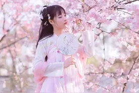 桃花不及美人妆，陌上花开，已醉春风图片