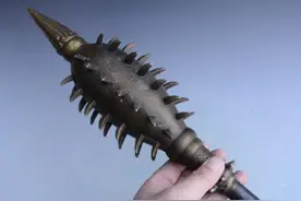 取自野兽牙齿的狼牙棒，重得需要托运轻易无法使用，真实威力如何图片