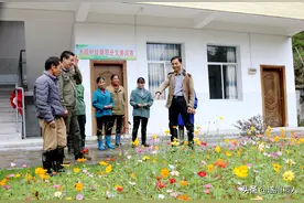 “残腿村支书”支起一片天图片