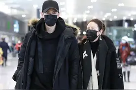 经超攥紧娇妻不撒手，一路高冷似霸总，妻子戴大牌围巾笑得像孩子图片