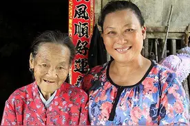 麦琼方：养活87个孩子只有1个是亲生的，马云曾邀请她一起敲钟图片