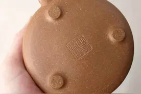 这肯定是买到假紫砂壶了！子冶石瓢底部有一圈“模具线”图片