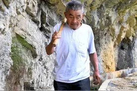 跨越时空的对话｜黄大发：立下愚公志 绝壁凿天渠图片