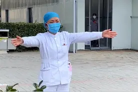 最美“逆行者”：扶沟一线女护士与女儿的隔空拥抱图片