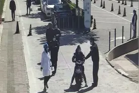带走！通州一女子就诊不配合测温，还辱骂了执勤的抓伤了出警的图片