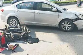 等红灯时被电动车追尾，导致电动车主受伤，汽车车主要担责吗？图片