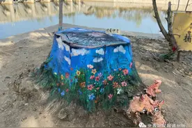 萌翻！通州运潮减河边，他把枯树桩巧手彩绘上各种动物图片