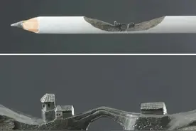 他将笔芯微雕做到极致，作品不足1厘米，需要显微镜才能看清细节图片