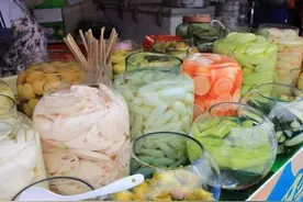 广东街头，却流行一种广西美食，13元一斤倍开胃，一天能卖3百斤图片