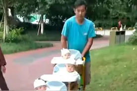 妻子一次性完成“三孩”任务，制作三孩专用婴儿车，建议全国普及图片