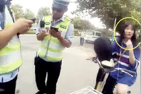 实拍：“萌妹子”交通违法被批评 离开后折返“撒娇卖萌”还送水视频封面