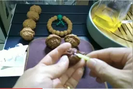 文玩核桃怎么封脐，一根蜡烛就可以完美的封底视频封面