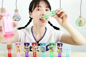 美食拆箱吃“魔法师果Q糖”，推一推长头发，果酱酸甜好味道视频封面