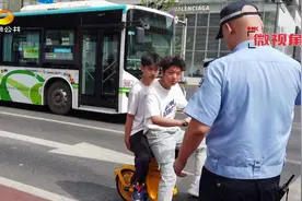 两人骑一辆共享电动自行车，交警：罚款五十！|帮女郎视频封面