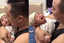 太坏了！爸爸看着宝宝忍不住亲两口，宝宝反应过来后表情逐渐委屈视频封面