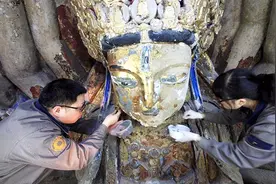 重庆修复800岁千手观音有大发现：腹部藏有暗格，打开后专家激动视频封面
