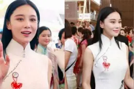 张馨予穿旗袍出国门，惊艳到老外争相与她合影，最美军嫂无疑了！视频封面