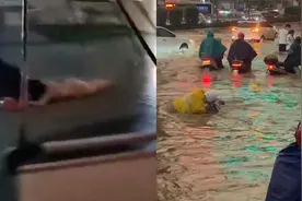 郑州遭遇狂风暴雨 大风刮跑棚子撞倒行人，积水过膝市民涉水骑行视频封面
