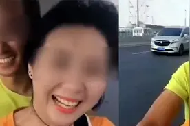 尴尬！实拍：女子骑电动车带着老公 期间还自拍秀恩爱 被交警罚款视频封面