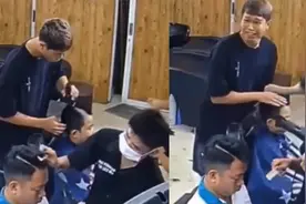 笑翻！国外理发师给一男童理发，下秒手滑剃光瞬间愣住视频封面