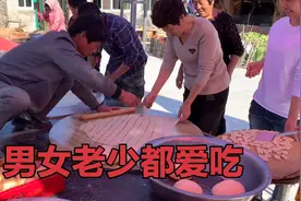 东北农村有习俗，婚宴流水席必须要炸果子，全村来帮忙，真热闹！视频封面