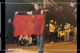 街头表演者舞动身姿，引得路人驻足观看，氛围热烈。视频封面