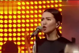 千年的，是黄土高坡最古老的摇滚乐，谭维维一首《给你一点颜色..视频封面