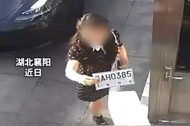 女子临时号牌识别不方便，自制DIY纸质号牌放大版并上路行驶，交警核查研究后，未予以处罚予以批评教育！#交通规则 #暖心执法视频封面