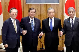 解读王毅访日：特朗普因素拉近中日韩，20项共识给日企指路图片