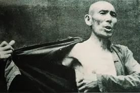 日军有多残忍？老人哭着说道：你看狗的嘴里含着什么？图片