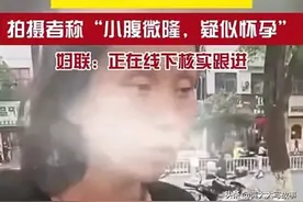 湖南街头流浪女，眼神忧郁，不言不语，知情人:小腹微隆疑似怀孕图片