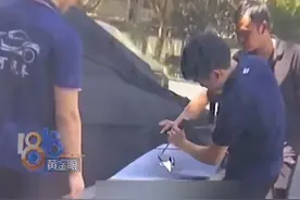 现实版掩耳盗铃，“北汽极狐”路上自燃，商家第一时间赶来扣车标图片