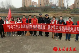 国网洋县供电公司：践行雷锋精神 共襄花海盛会图片