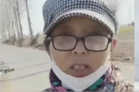 河南开封一陌生大妈在军事区拿专业相机拍照逗留两小时被疑似间谍图片
