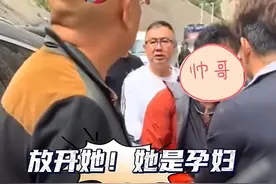 后续！318国道孕妇逆行插队打人，红衣男子反赔1万元，网友：逆天图片