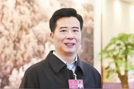 全国两会访谈丨全国人大代表黎春秋：奋力打造中部地区开放发展新高地图片