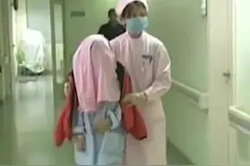 马面女孩吴小燕：纱巾蒙面13年，面部手术取出2公斤肿物后迎爱情图片