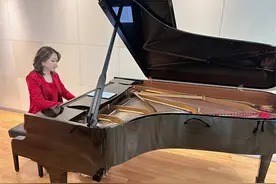 用黑白键弹出《二泉映月》《阳关三叠》等中国名曲，这本乐谱向世界传递“中国之声”图片