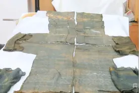 700多年前丝绸服饰修复再现辉煌图片
